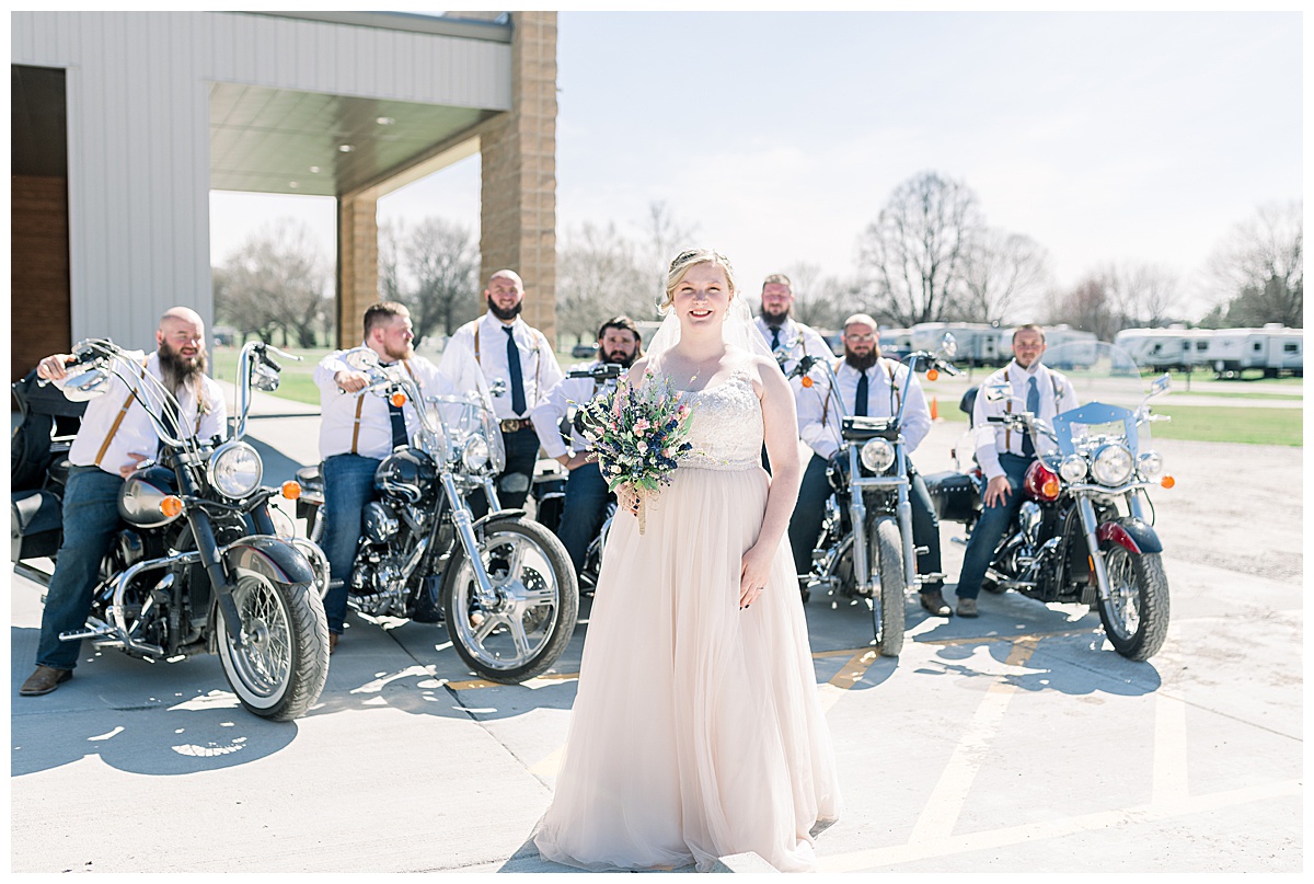 bride with groomsmen on motorcycles