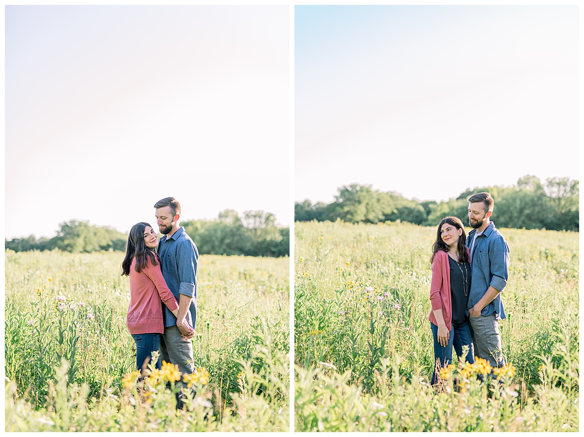 couple standing in field of flowers