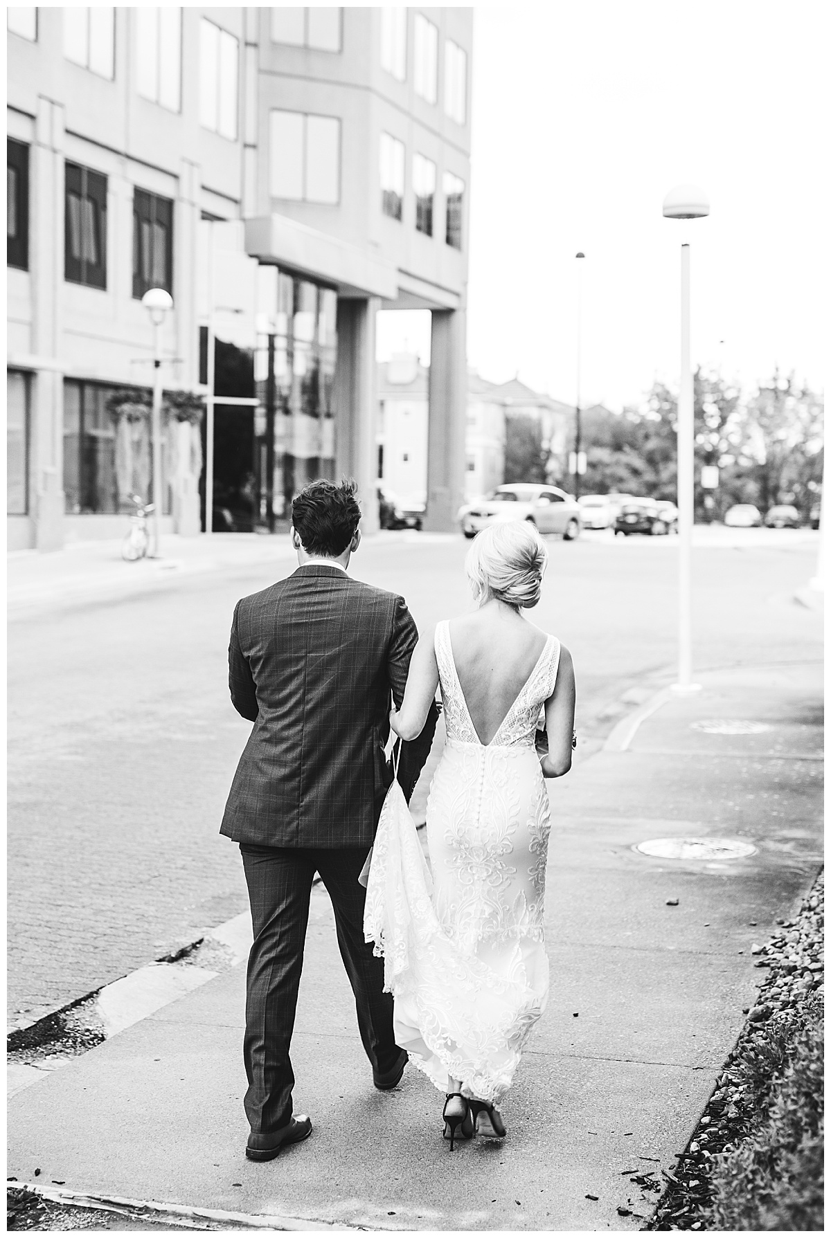 couple walking grand street kc wedding