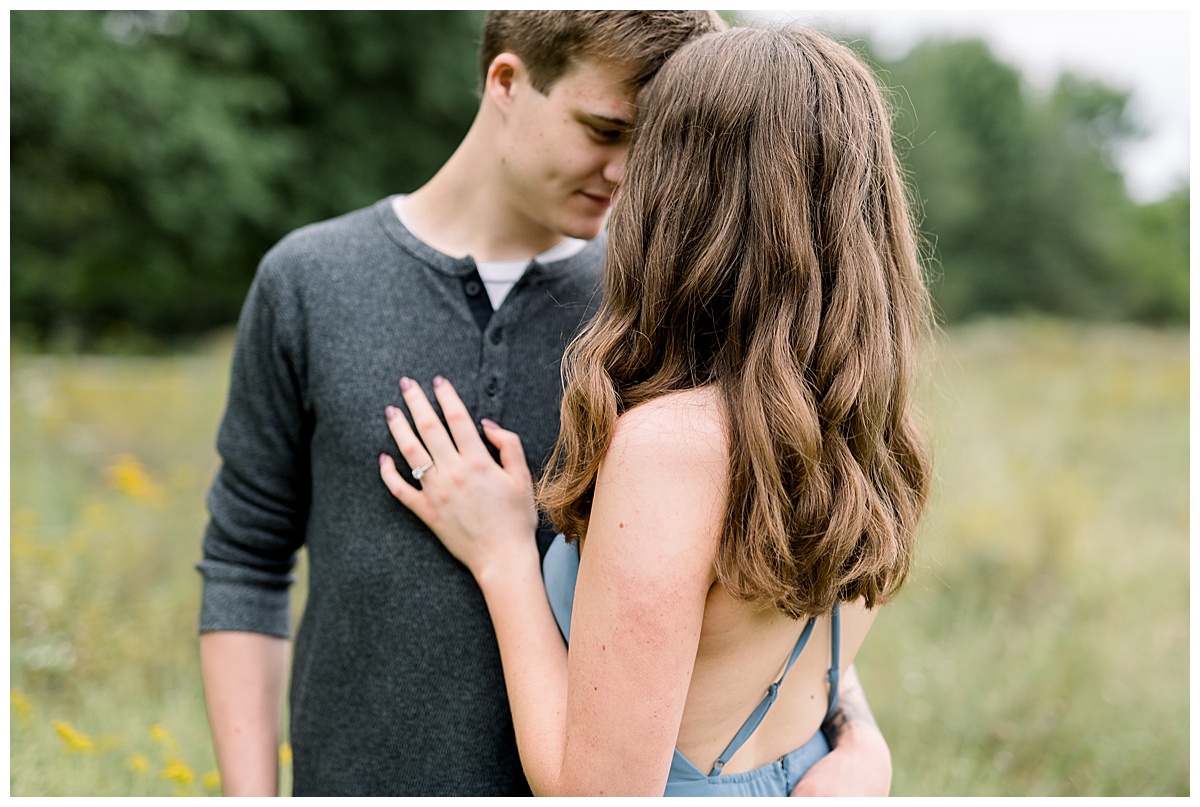 engagement photos in field of flowers