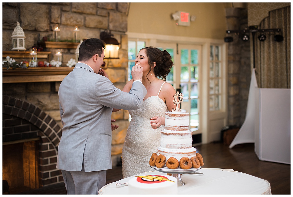 elms hotel wedding couple cutting cake