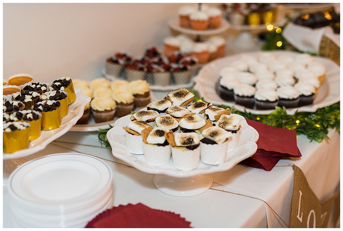 wedding reception dessert table cheesecake cupcakes
