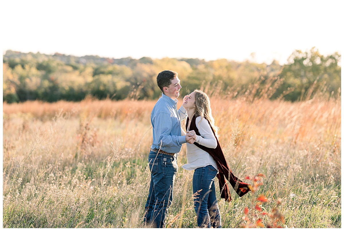 Shawnee Mission Park Engagement couple laughing in field